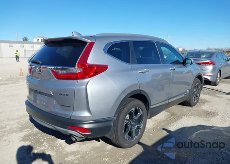 2018 Honda Cr-V Touring z USA, uszkodzony, nr VIN 7FARW2H94JE058771